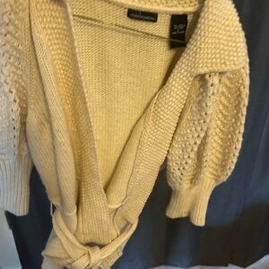 MODA INTERNATIONAL puff sleeve tie waist sweater.